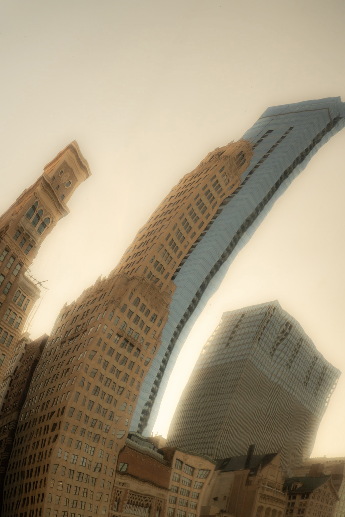 Abstract tilted New York City skyscrapers with warm tones