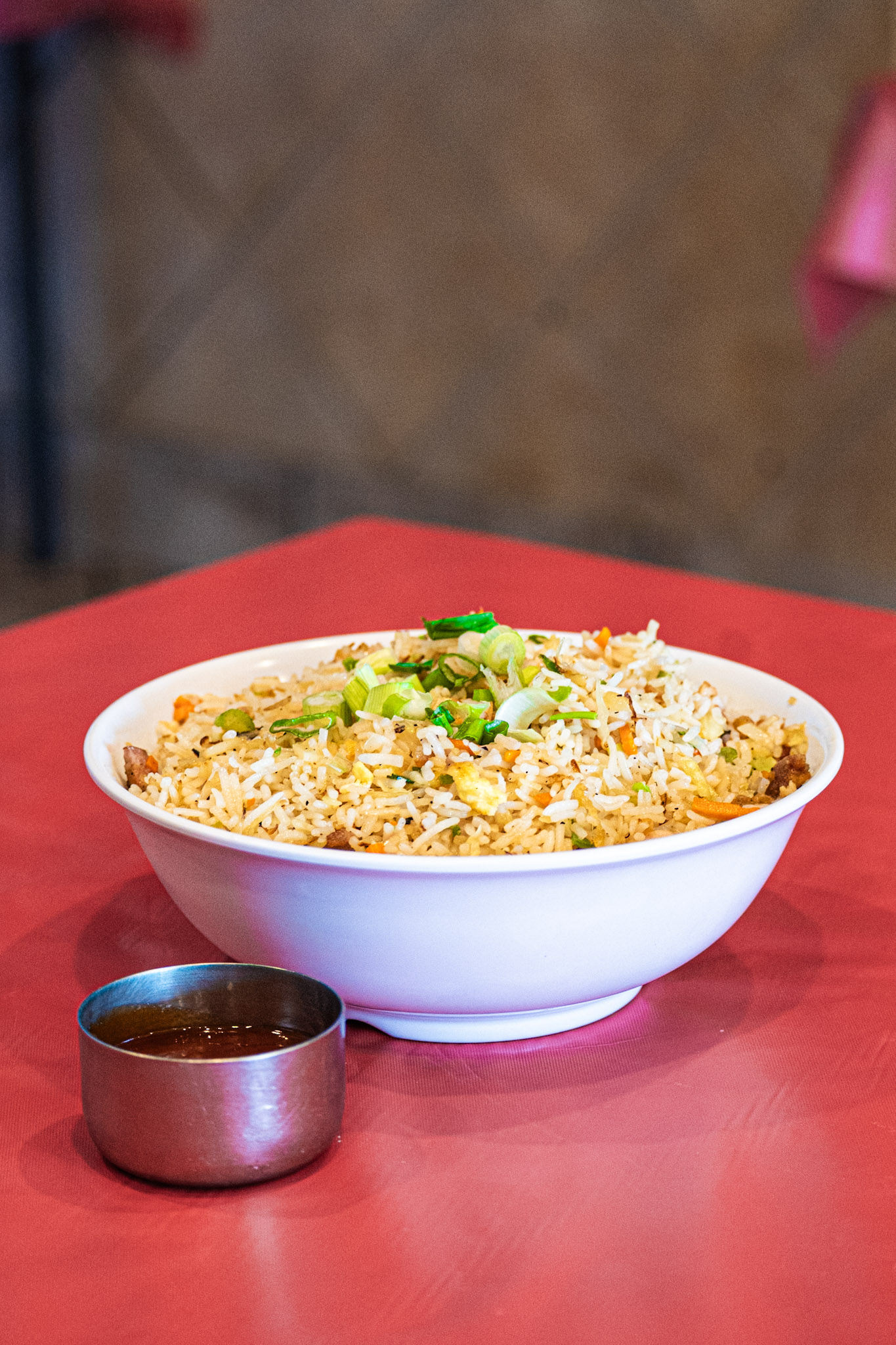Fried rice bowl on red tablecloth â€” AHA South Indian Cuisine